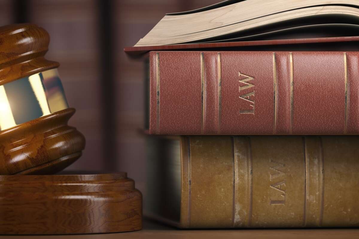 Justice, law and legal concept. Judge gavel and law books.