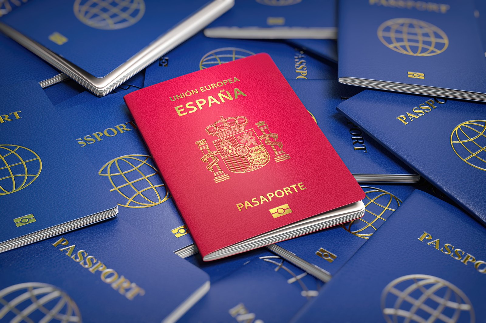 Passport of Spain on the pile of passports of other countries.