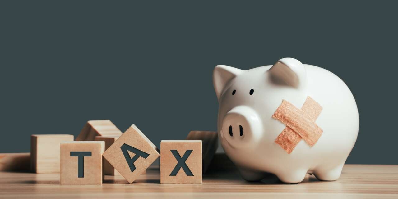 Tax on wooden blocks. Business and tax concept. Financial calculation, tax, accounting