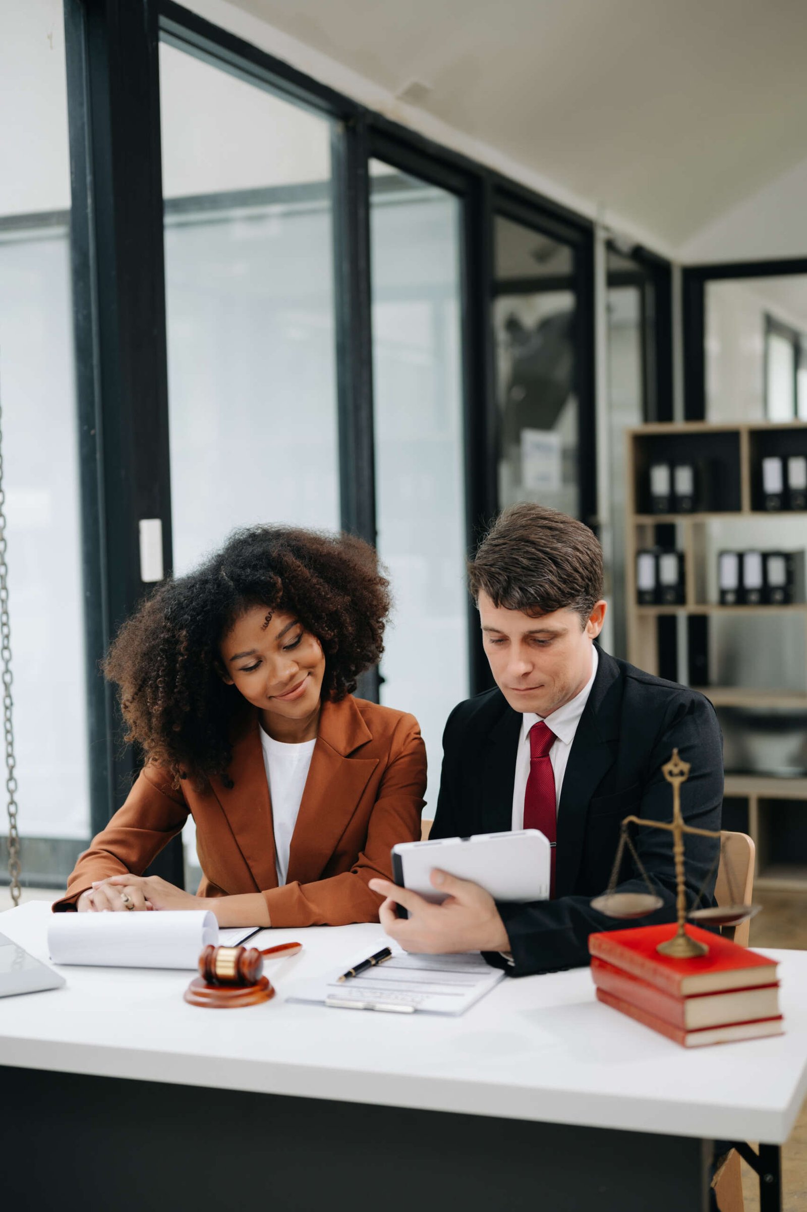 Lawyers reviewing property contract papers