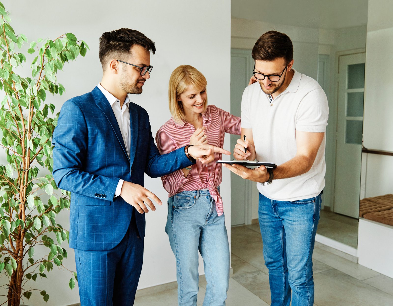 Couple signing a real estate contract